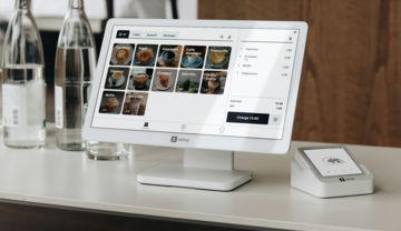 a-desktop-computer-sitting-on-top-of-a-desk.jpg A desktop computer sitting on top of a desk